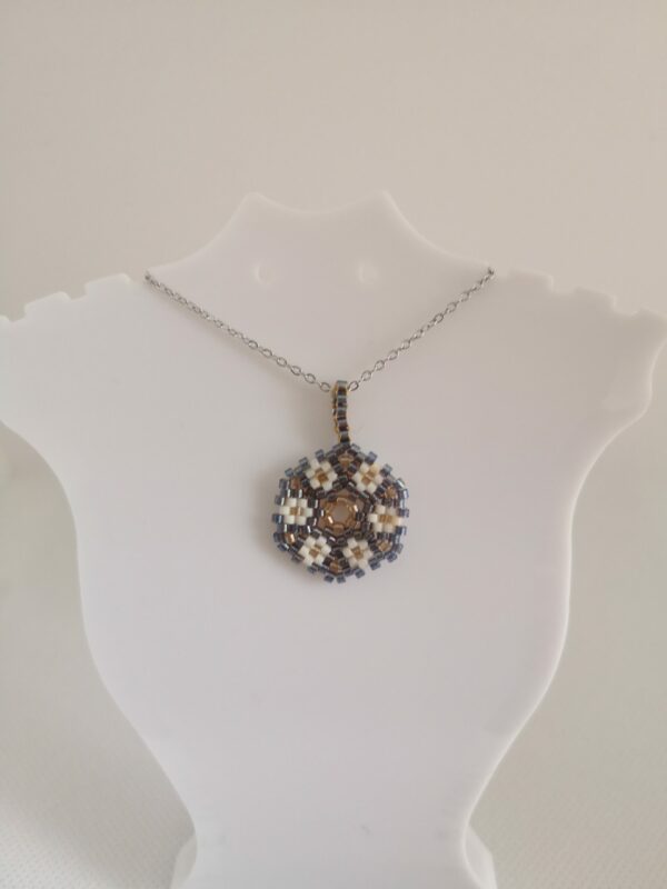 Pendentif Rond motif floral bleu